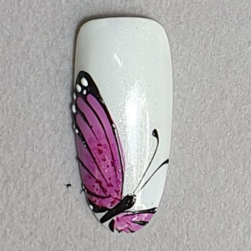 Thiết kế bướm hồng Kirsis: Khám phá thiết kế bướm hồng Kirsis mới lạ và đầy phong cách. Với phần thân bắt mắt và các đường nét xanh thướt tha, họa tiết này chắc chắn sẽ mang đến cho bạn những trải nghiệm đầy bất ngờ và hạnh phúc.