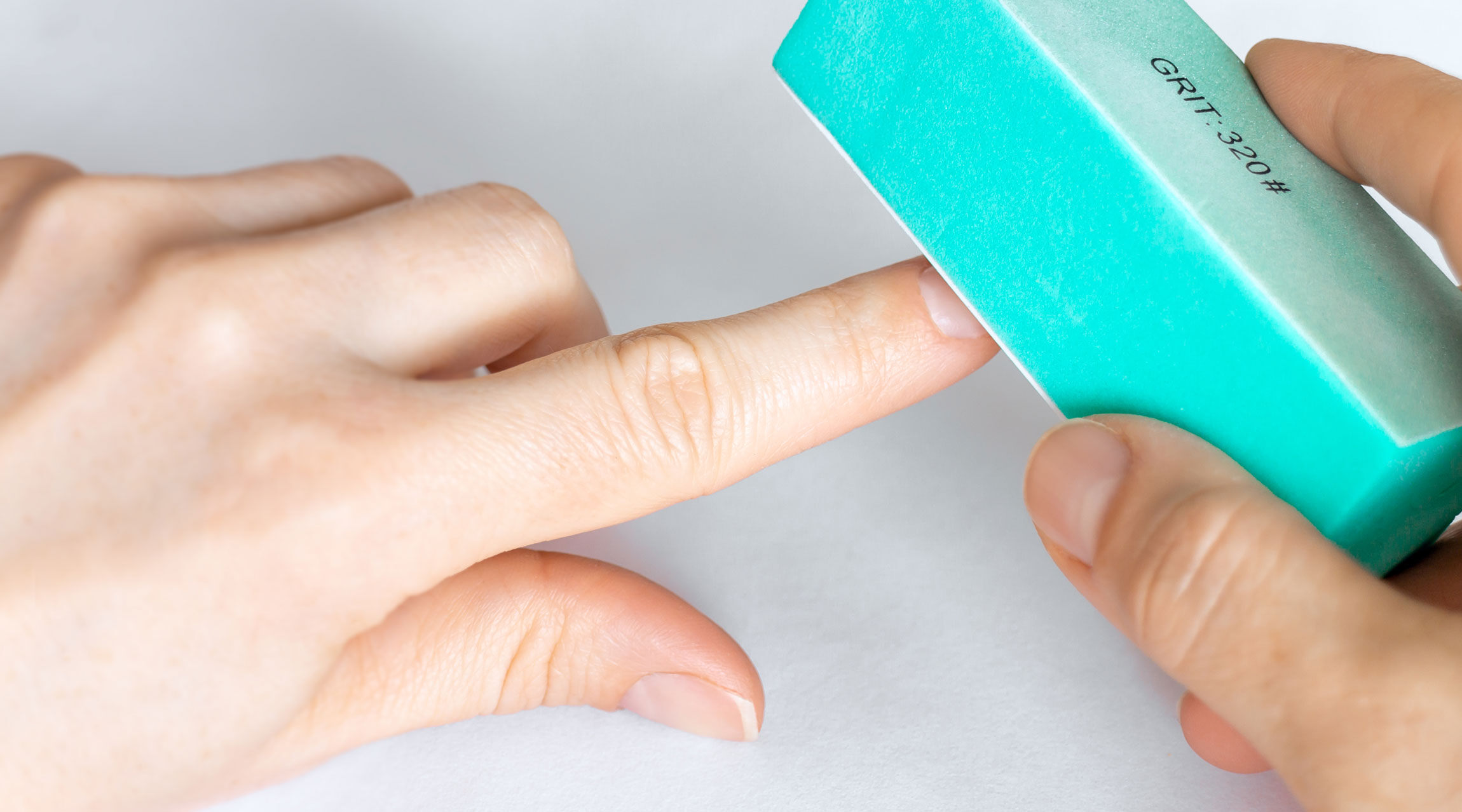 filling_top_nails_buffing